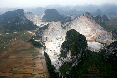 Stone pits cut away into the mountainous area of Wuming near Nanning.