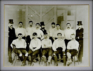 A photograph of the Preston North End FC team of 1888 - 1889, known as 'The Invincibles', displayed on a wall at their ground, the Deepdale Stadium. They were the first English football team to win 'T...