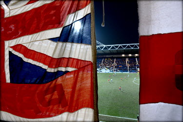 Union Jack and England flags hanging at Preston North End's Deepdale Stadium in Lancashire during a match. The football club was founded in 1863 and they play at the oldest professional ground in the...
