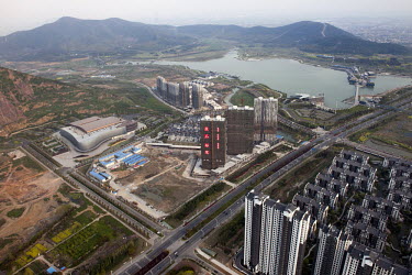 On a plateau above th ecity a new development of high rise houses are being built next to an artificial lake at Jiangyin Yushanhu Park.