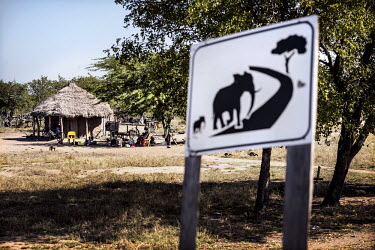 Close to the gate of the park a sign warns of elephants crossing the road. Farmers near the park lose their crops due to elephants. Limpopo National Park is connected to the famous Kruger Park in Sout...