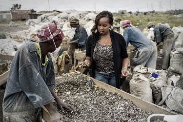 Lorna Rutto at sorting site near Dandora dump where shredded waste plastic is cleaned and foreign materials like small metal pieces are removed with magnets. All domestic and industrial waste is dumpe...