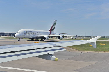 An airbus A380 belonging to Emirates Airlines stands on the tarmac at Heathrow Airport. It is the world's largest passenger airplane.