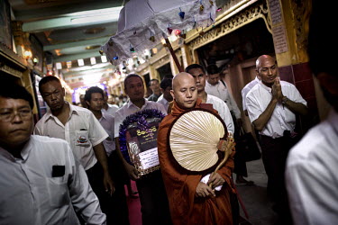 U Wirathu, the spiritual leader of the 969 Buddhist Nationalist movement, and his entourage leave after giving a sermon, at a monastery in Mandalay. U Wirathu is an abbot in the New Maesoeyin Monaster...
