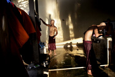 Monks who are students of U Wirathu, the controversial Buddhist nationalists monk and spiritual leader of the 969 Movement, wash at the New Maesoeyin Monastery in Mandalay. U Wirathu is an abbot in th...