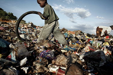 Five year old Patrick lives on the rubbish dump and is cared for by his grandmother. He and his twin brother Petrous were abandoned by their parents. Their grandmother recycles waste from the dump. Sh...