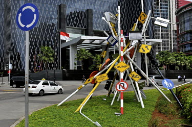 A public art work, made up of various bits of roadside signage, in the Kuningan business district.
