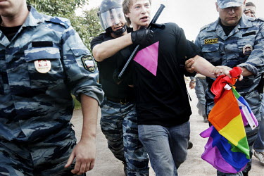Image result for Daniil Grachev, an LGBTQ rights activist, is arrested by riot police during a pride event in St. Petersburg, 2013.