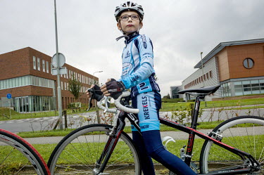 Young cyclists, from the Mountainclimbers cycling club, training on an industrial estate near Maastricht Airport.