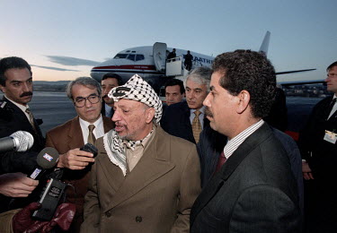 PLO Chairman Yassir Arafat talks to reporters just prior to leaveing Oslo, after receiving the Nobel Peace Prize. The Nobel Peace Prize 1994 was awarded jointly to Yasser Arafat, Shimon Peres and Yitz...