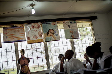 Nurses sit in a classroom as they undergo training in mental health from The Carter Centre at Phebe Hospital. In 2013 Liberia had only two psychiatrists in the entire country.