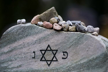 Stones placed on a tombstone in the Weissensee Cemetery, the biggest Jewish cemetery in Europe.