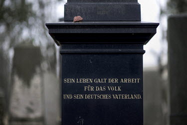 A tombstone in the Weissensee Cemetery, the biggest Jewish cemetery in Europe. The sentence: 'sein leben galt der arbeit fur das volk und sein deutches vaterland' refers to the fact that the man burie...