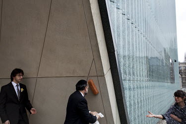 Chief Rabbi Michael Schudrich of Poland places a Mezuzah at the entrance to the Museum of History of Polish Jews, designed by Finish architects Rainer Mahlamaeki and Ilmari Lahdelma, built on the site...