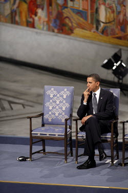 US President Barack Obama waits for the presentation of the Nobel Peace Prize during a ceremony in Oslo Town Hall.