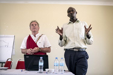 Ron Layton giving a speech through a translator during a meeting with Maasai elders and chiefs in Simangiro District in an effort to create a General Assembly representing all the Maasai. The Maasai I...