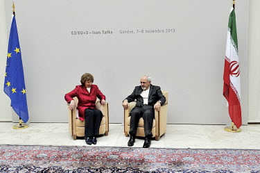 Catherine Ashton, the European Union's High Representative for Foreign and Security Policy and Iranian Foreign Minister Mohammad Javad Zarif get up from a pair of chairs in the Palais des Nations (UN)...