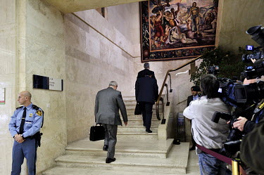 Delegates pass the press pool on their way to the start of a second round of the E3/EU+3 Iran talks in the Palais des Nations (UN). The E3 / EU + 3 talks, which include the UK, France and Germany plus...