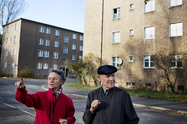 Renate Reistel (left) and her husband Guenter walk around Apartment Complex I on Rosa-Luxemburg-Strasse. Guenter used to live here as a young man. Today, all the apartments in the complex are empty....