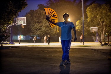A Chinese member of staff practices Tai Chi at China House in Kitwe, this is a secure compound where all senior level employees at the NFCA's (Non-Ferrous Company Africa) Chambishi copper mine are acc...