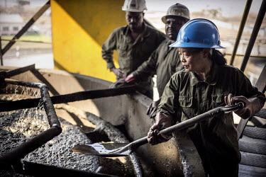 A Chinese operations manager in the concentrator, where the ore is crushed and processed into copper concentrate, at the NFCA's (Non-Ferrous Company Africa) Chambishi copper mine. The NFCA, a Chinese...
