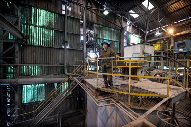 A Chinese operations manager in the concentrator, where the ore is crushed and processed into copper concentrate, at the NFCA's (Non-Ferrous Company Africa) Chambishi copper mine. The NFCA, a Chinese...