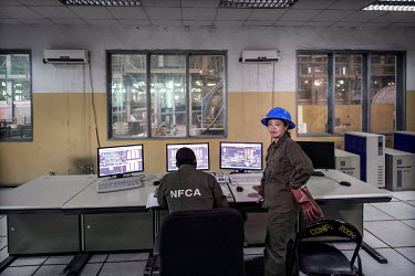 A Chinese operations manager in the control room of the concentrator, where the ore is crushed and processed into copper concentrate, at the NFCA's (Non-Ferrous Company Africa) Chambishi copper mine....