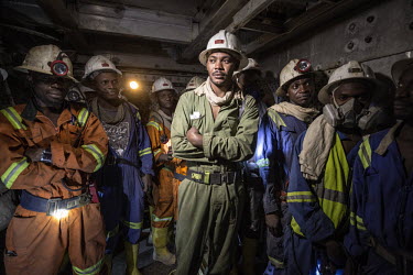 Miners in the lift cage on there way underground at the NFCA's (Non-Ferrous Company Africa) Chambishi copper mine. The NFCA, a Chinese company, owns and operates several mines and plants in the Copper...