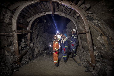 Miners inspect the support structure at the NFCA's (Non-Ferrous Company Africa) Chambishi copper mine. The NFCA, a Chinese company, owns and operates several mines and plants in the Copperbelt. The Ch...