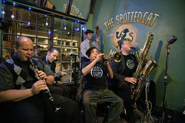 The New Orleans Cottonmouth Kings play at the Spotted Cat on Frenchman Street. This is in the heart of the city's late night music scene where visitors can enjoy world class performances for the price...