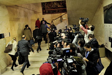 Journalists and other press at the entrance of the Palais des Nations film the arrival of delagates for the the third, and ultimately successful, round of the E3/EU+3 Iran talks. The E3 / EU + 3 talks...