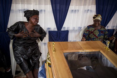 Two women grieve at the funeral of Judge Modeste Martineau Bria who was killed by Seleka fighters in Bangui. The murder of Bria led to an outpouring of public anger at the reign of fear imposed by Sel...