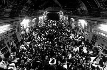 Over six hundrend people are evacuated from Tacloban to Manila on board a US C-17 military transport plane. Typhoon Haiyan, or Typhoon Yolanda as it is known in the Philippines, was the deadliest typh...