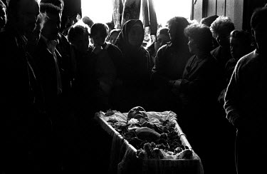 The funeral cortege of a young man who was killed while riding a motorbike, arrives at the Ukrainian Catholic church on the outskirts of Lviv. During Soviet times Ukrainian style funerals such as this...