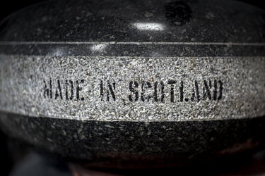 A curling stone, made from Ailsa Craig granite and engraved with a 'Made in Scotland' logo, at Kay's in Mauchline, Faslane. The company uses the same rock to make the stones that will be used at the S...