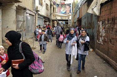 A street scene in the Palestinian refugee camp of Shatila (Chatila) where Syrian refugees from the Syrian civil war have found refuge. The camp was set up in 1949 to accommodate Palestinian refugees f...