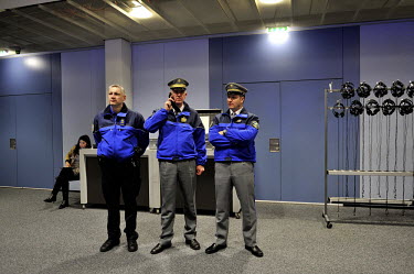 Members of the Gendarmerie of the Canton of Vaud in a corridor of the Montreux Palace Hotel where the Geneva II Syria talks are taking place. The Geneva II talks being held in Montreux on Lake Geneva...
