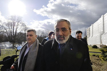 Syrian Minister of Information Omran al-Zoubi with staff, in the park of the Palais des Nations during the Geneva II Syria talks. The Geneva II talks being held in Montreux and Geneva between 22 and 2...