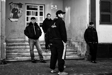 Mafia (or camorra) members control the entrance to a building where drugs are being sold in Naples' Scampia district. The city's mafia organisations control the illegal drug trade and different mafia...