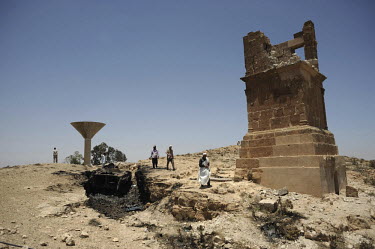 A wrecked tank lies beneath a Roman building that was damaged by troops loyal to Muammar Gadaffi. In contrast to the initial stalemate on Libya's eastern fronts, in Benghazi and Misrata, the rebels in...