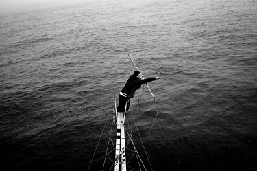 From high above the deck, Hally Henneberry points to the position of a swordfish. There are conflicting arguments as to the health of the North Atlantic Broadbill swordfish (Xiphias gladius) populatio...