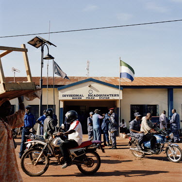 The Sierra Leone national flag flies at the entrance to the divisional headquarters and central police station in Makeni.