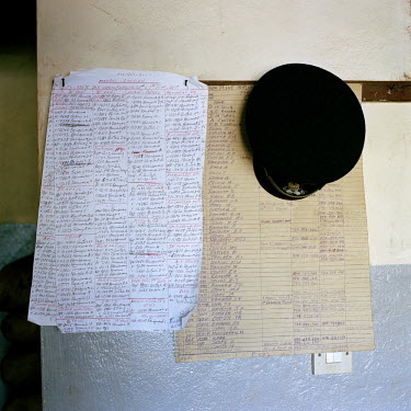 A duty roster hangs on the wall at the divisional headquarters and central police station in Makeni.