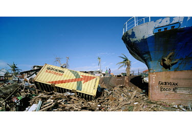 A shipping container lies on a mass of rubble beside a ship in a scene of mass devastation in Tacloban city after Typhoon Haiyan swept through the Philippines. Typhoon Haiyan, or Yolanda as it is know...