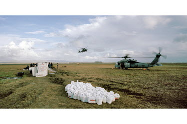 Helicopters load with aid, to be delivered to remote parts of Leyte Island. Typhoon Haiyan, or Yolanda as it is known in the Philippines, made landfall on 8 November 2013 and was one of the deadliest...