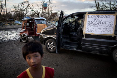 A poster taped to a car, at Tacloban Airport, appeals for family members who survived Typhoon Haiyan. Typhoon Haiyan, or Yolanda as it is known in the Philippines, made landfall on 8 November 2013 and...