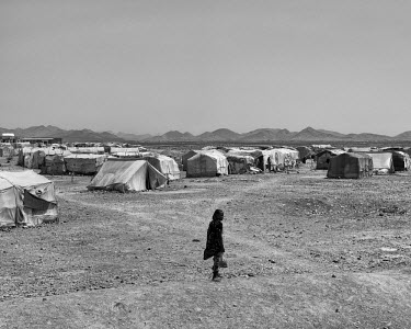 A child standing at the edge of Kharaz refugee camp. The camp holds roughly 15,000 mostly Somali migrants, half of whom are children. The United Nations Refugee Agency (UNHCR) has raised concerns over...
