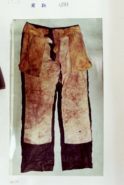 The front of a blood stained pair of trousers. It formed part of the evidence against Iwao Hakamada. It was found inside a miso tank at the factory where he worked. Courtesy by Shimizu Shizuoka citize...