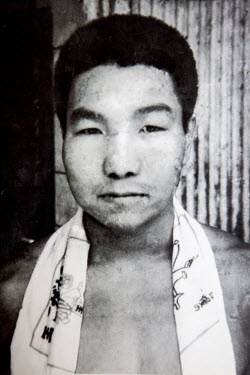 A copy of a photo of Iwao Hakamada (undated) when he was working for Kogane miso factory. He was later accused of murdering the company president.  Courtesy of Hideko Hakamada.Iwao Hakamada (b. 1936)...
