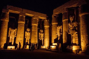 Luxor Temple illuminated at night.